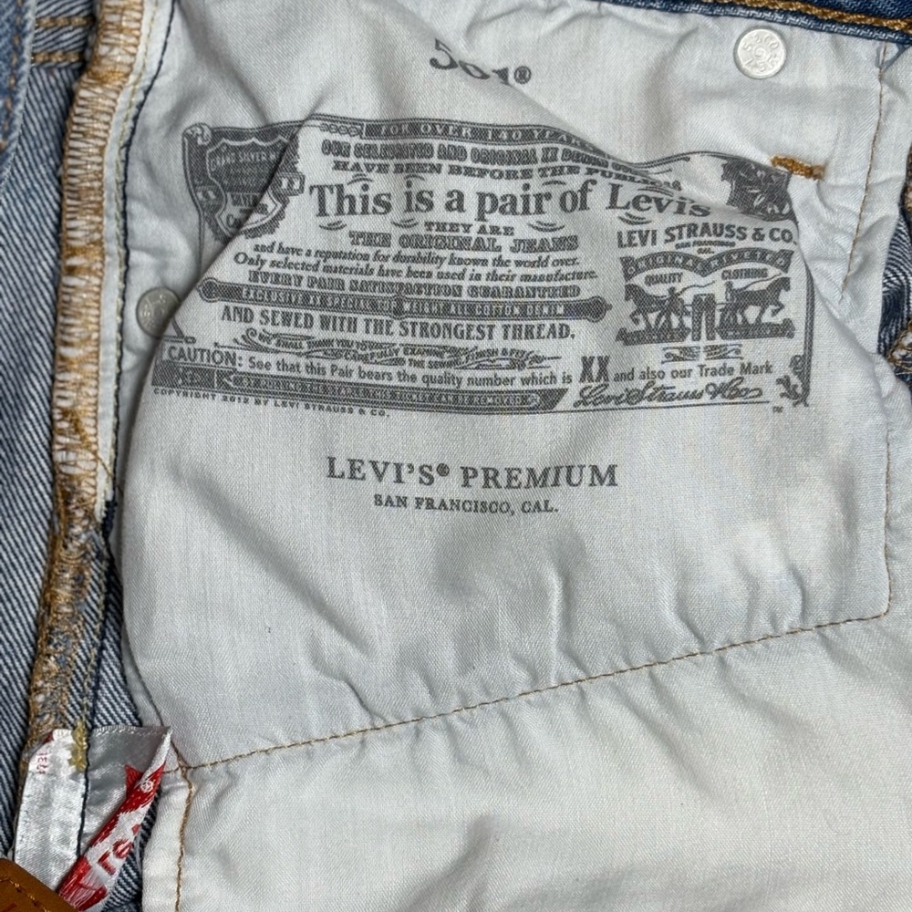 Levi's Classic Blue Ripped Jean Shorts - Picture 6 of 14